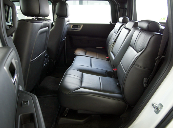 Jaguarundi Curl. Black Hummer H2 Interior